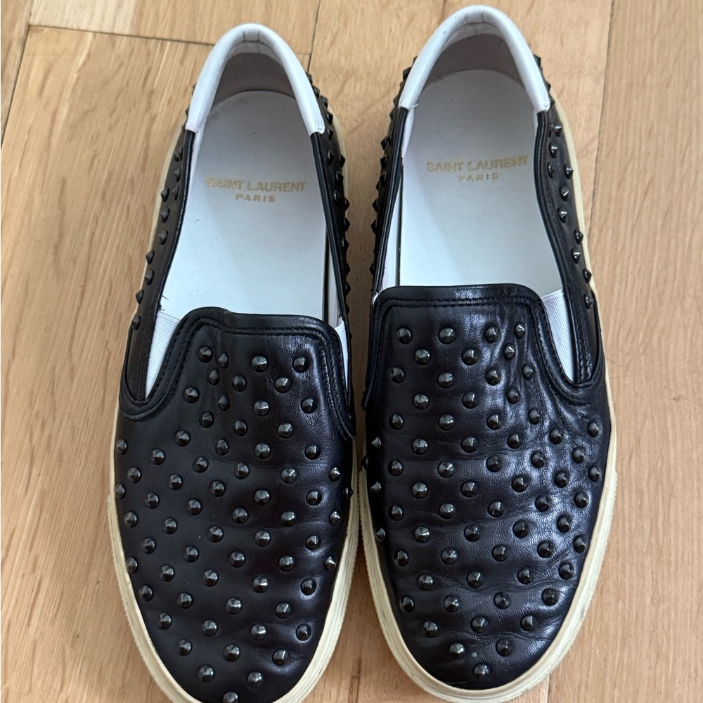 Saint Laurent Black Studded women’s Slip-On Shoes